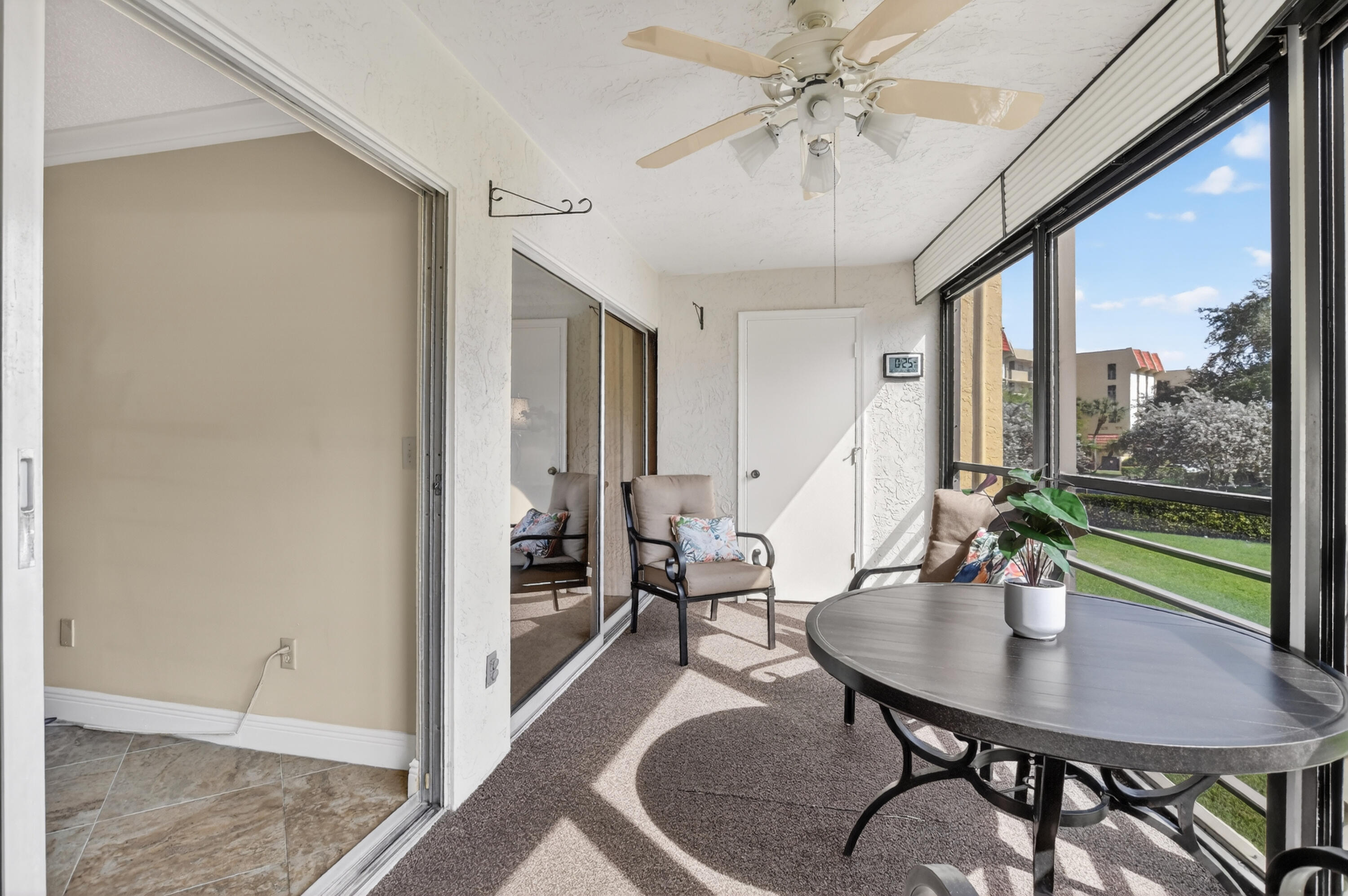 23345 Carolwood Lane, Unit 205 Boca Raton, FL 33428 - Photo 11 of 59 a view of a dining room with furniture window and outside view