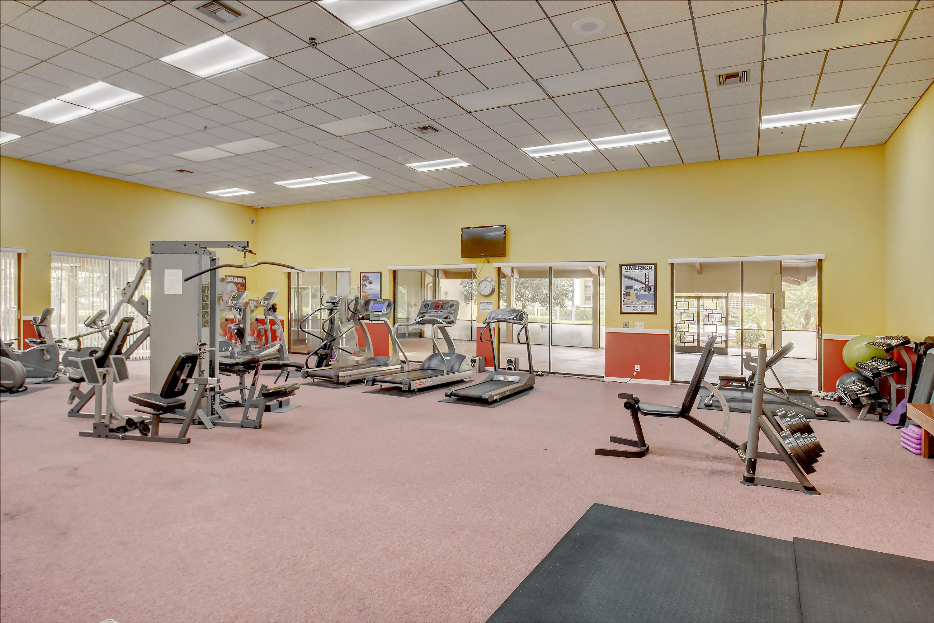 23345 Carolwood Lane, Unit 205 Boca Raton, FL 33428 - Photo 30 of 59 a view of a room with gym equipment