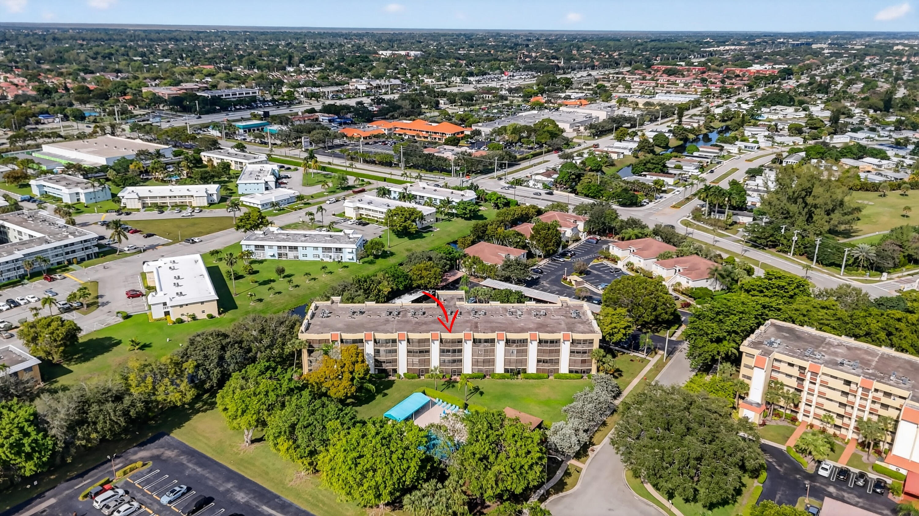 23345 Carolwood Lane, Unit 205 Boca Raton, FL 33428 - Photo 41 of 59 an aerial view of residential houses with city view