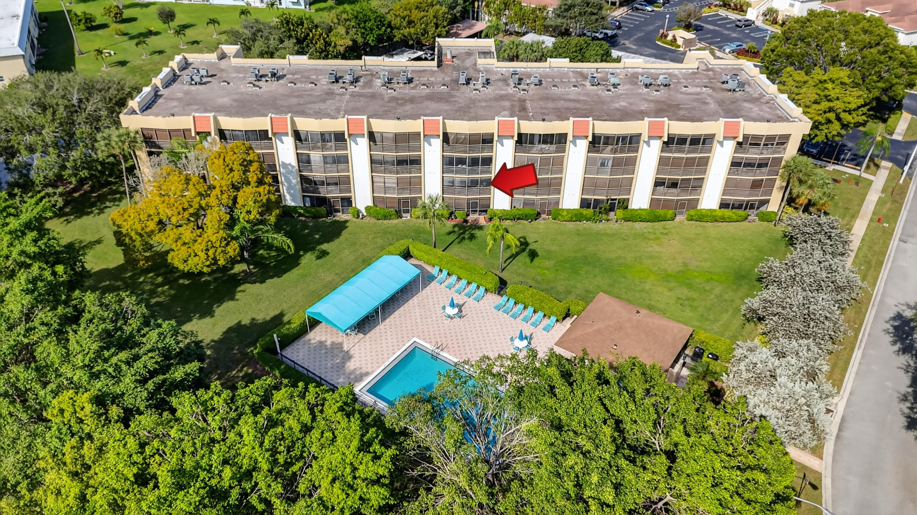 23345 Carolwood Lane, Unit 205 Boca Raton, FL 33428 - Photo 44 of 59 an aerial view of a house with garden space and street view