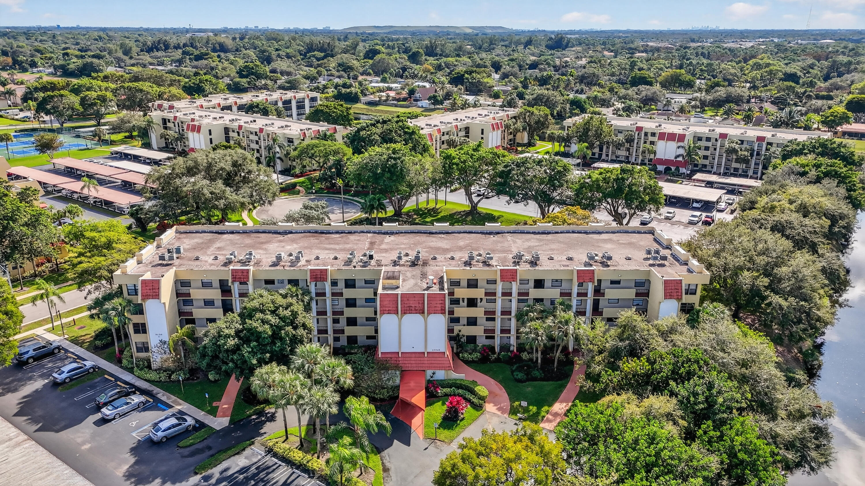 23345 Carolwood Lane, Unit 205 Boca Raton, FL 33428 - Photo 51 of 59 an aerial view of a city