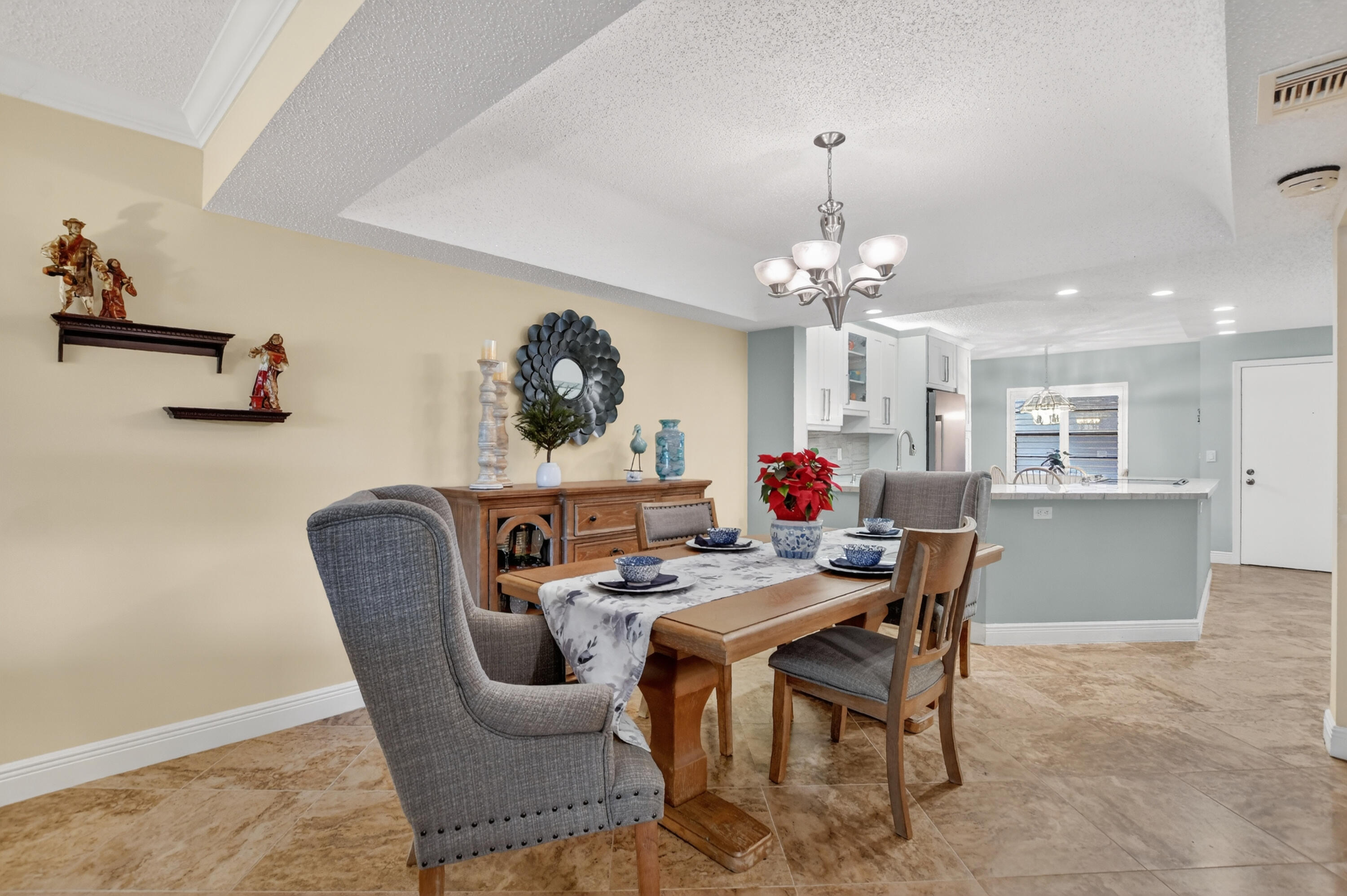 23345 Carolwood Lane, Unit 205 Boca Raton, FL 33428 - Photo 8 of 59 a dining room with furniture and window