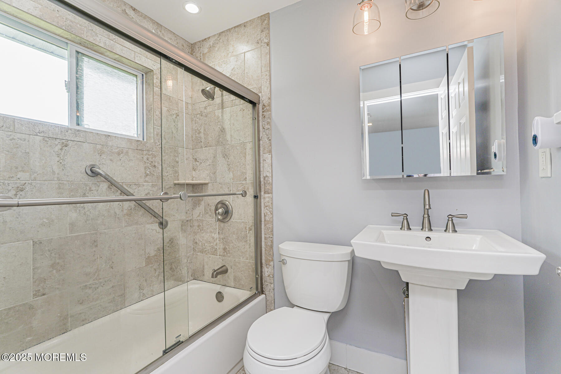 220 Highwood Road Oakhurst, NJ 07755 - Photo 22 of 30 a bathroom with a sink toilet and shower