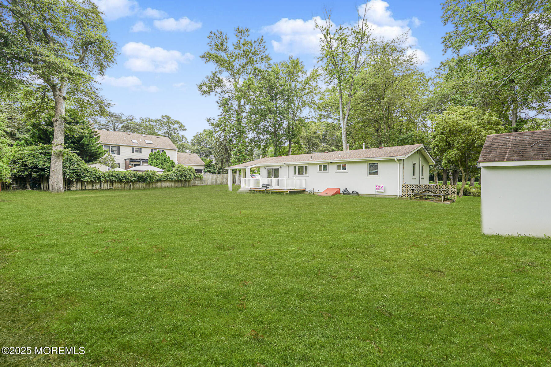 220 Highwood Road Oakhurst, NJ 07755 - Photo 27 of 30 a view of a house with a yard
