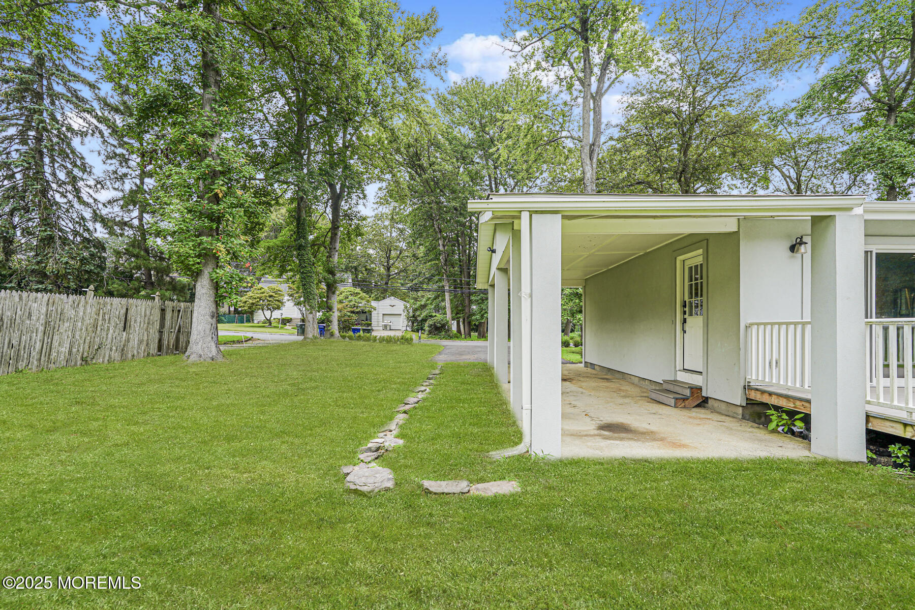 220 Highwood Road Oakhurst, NJ 07755 - Photo 6 of 30 a view of a backyard with small cabin