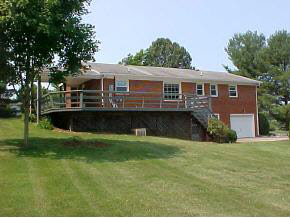 148 Baynes Road Waynesboro, VA 22980 - Photo 2 of 4 a front view of a house with a yard