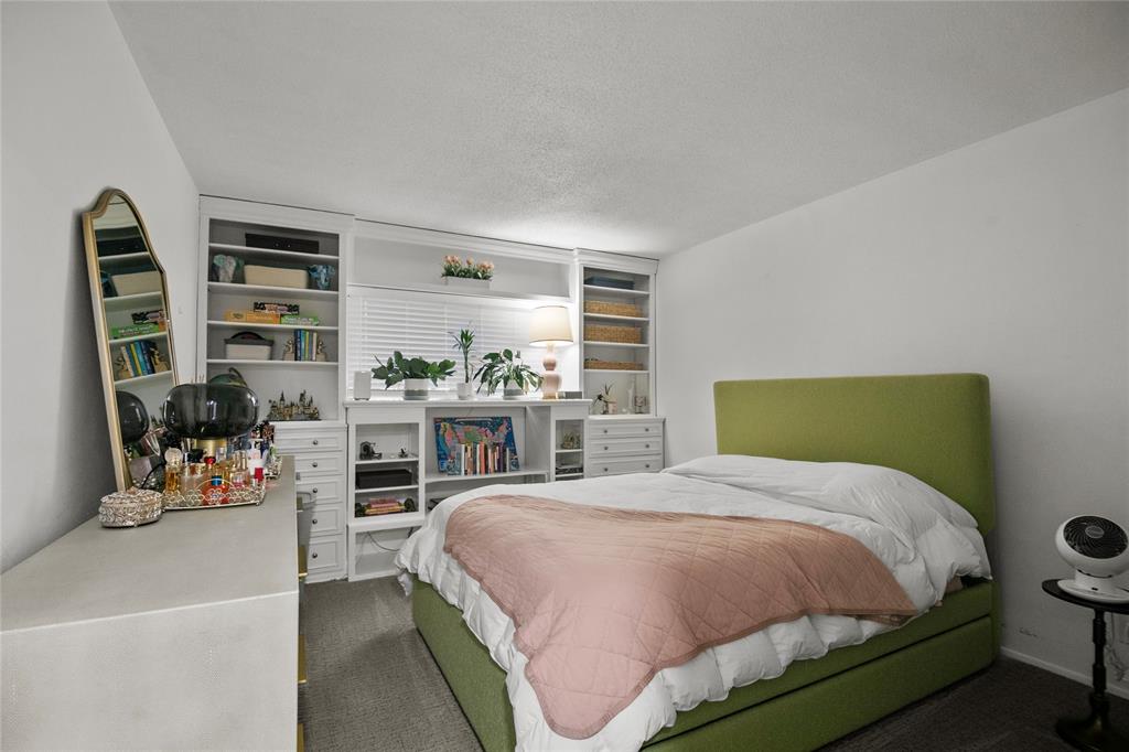 2141 Northeast 68th Street, Unit 107 Fort Lauderdale, FL 33308 - Photo 10 of 20 a bedroom with a bed and a window