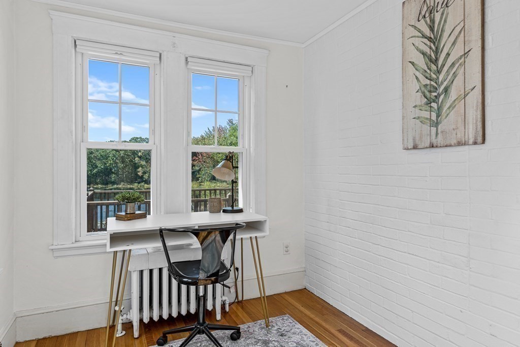 32 Woodside Road Winchester, MA 01890 - Photo 22 of 42 a view of a room with a table and chairs