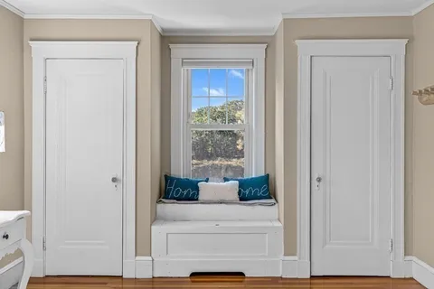 a bathroom with a toilet a sink and a mirror