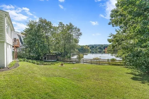 a view of a swimming pool with a garden