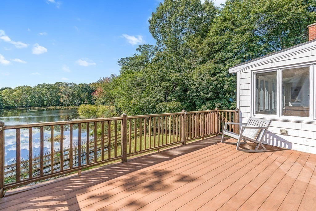 32 Woodside Road Winchester, MA 01890 - Photo 7 of 42 a view of balcony with wooden floor and fence