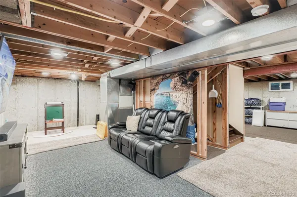 a living room with furniture and a table