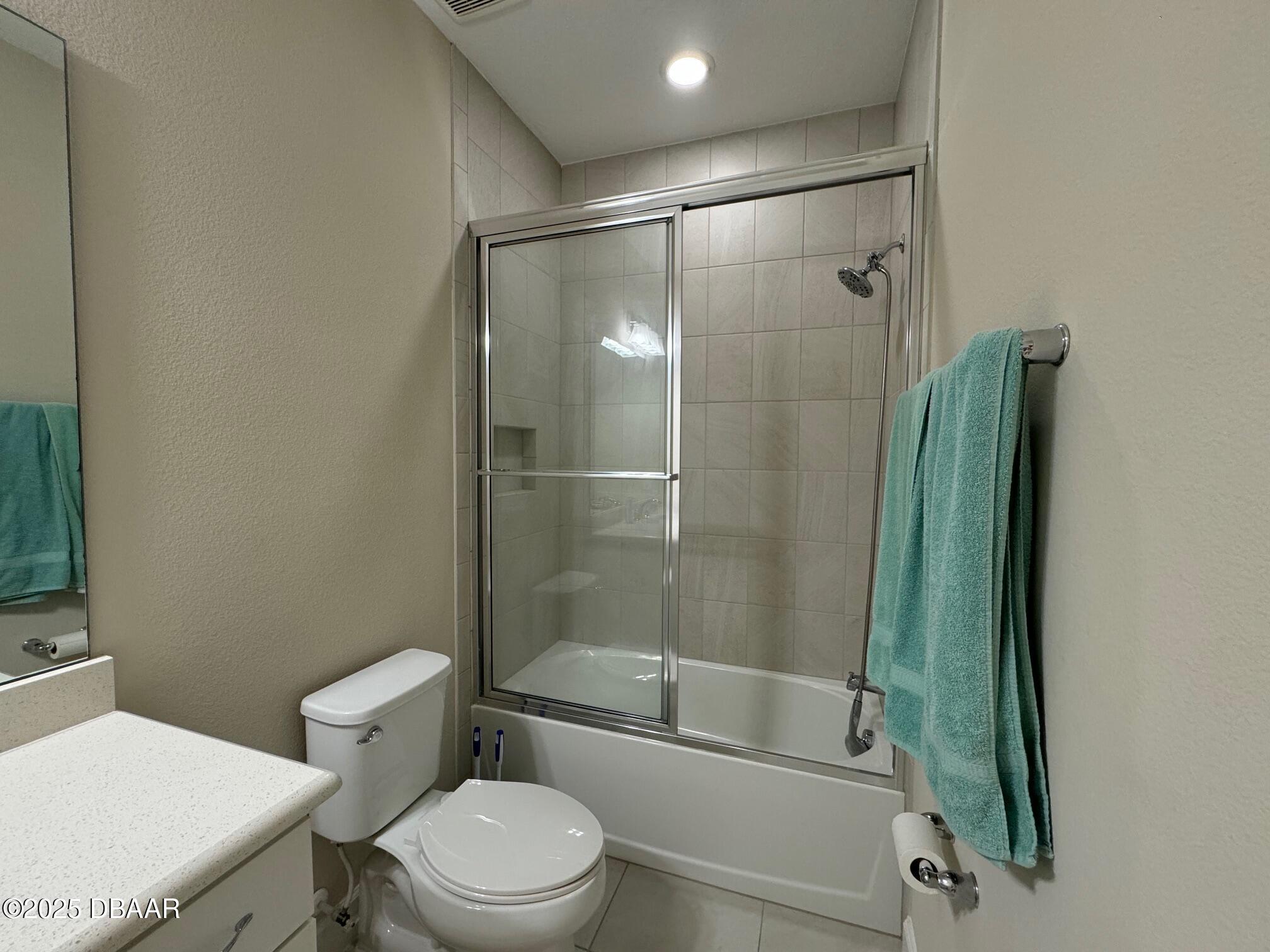 1016 Sea Shell Court Daytona Beach, FL 32124 - Photo 14 of 25 a bathroom with a shower and a toilet