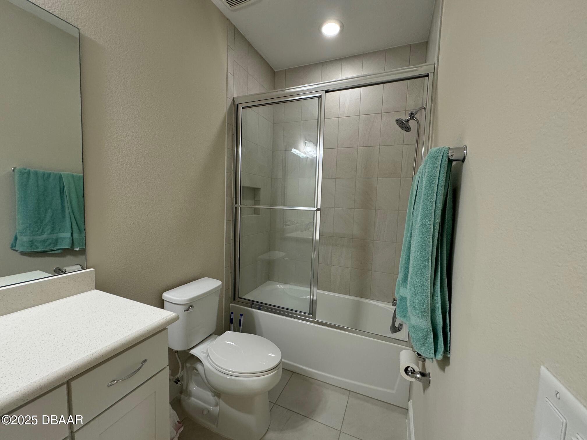 1016 Sea Shell Court Daytona Beach, FL 32124 - Photo 15 of 25 a bathroom with a shower a toilet and a sink