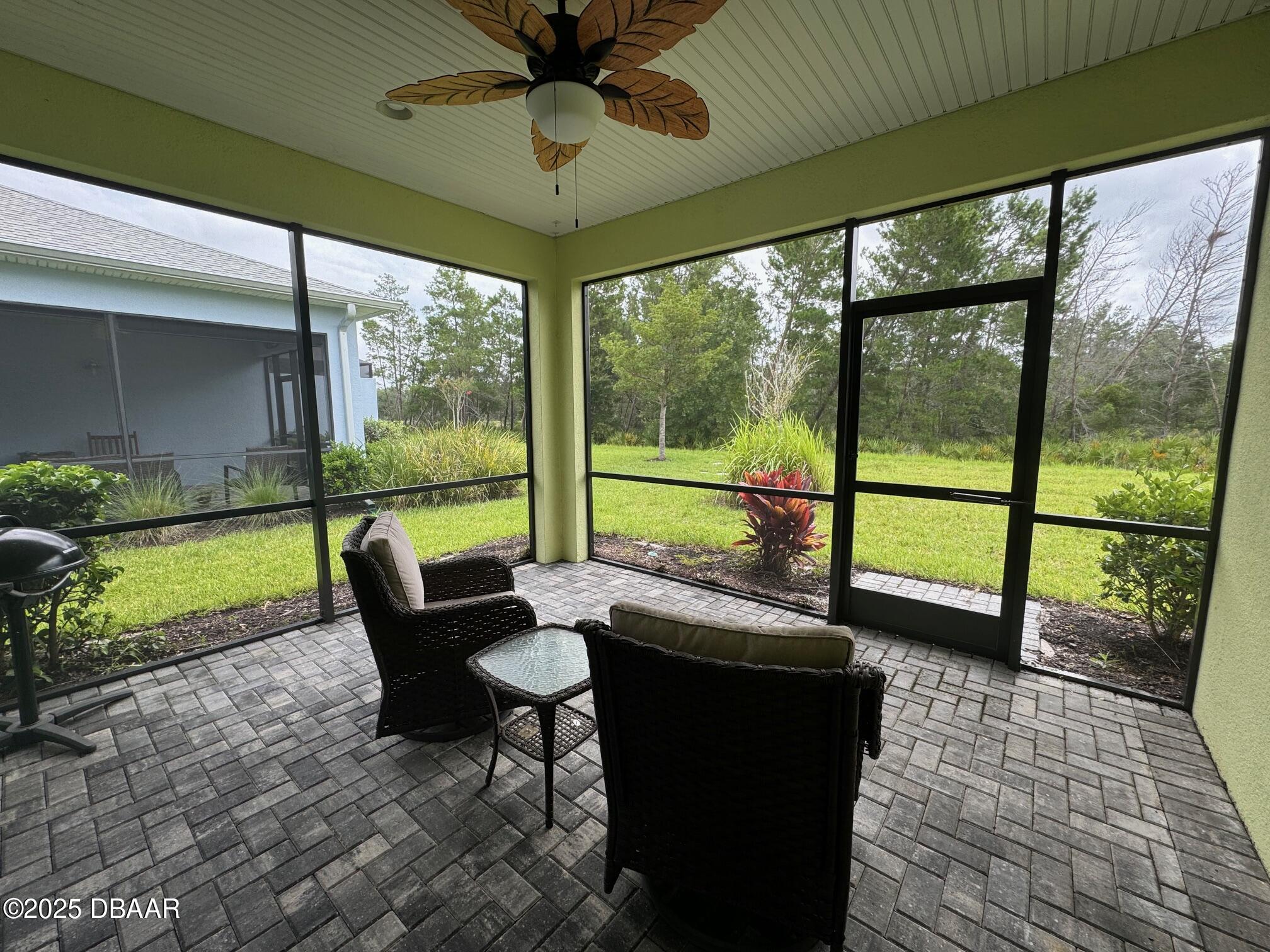 1016 Sea Shell Court Daytona Beach, FL 32124 - Photo 21 of 25 a view of a porch with furniture and a yard