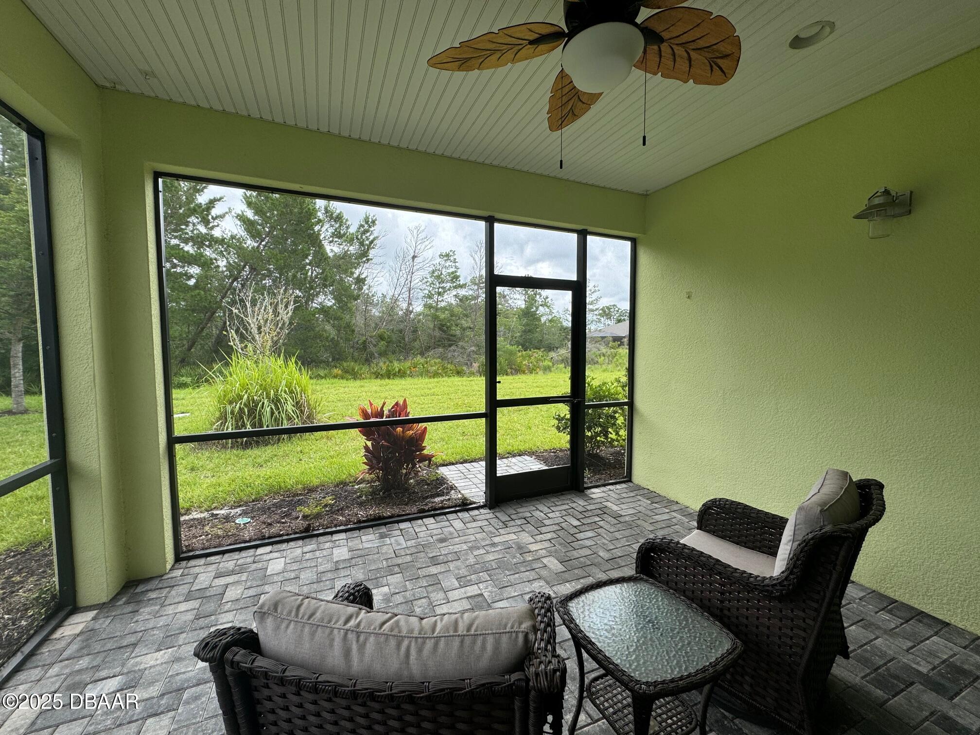 1016 Sea Shell Court Daytona Beach, FL 32124 - Photo 22 of 25 a view of a porch with furniture and a yard