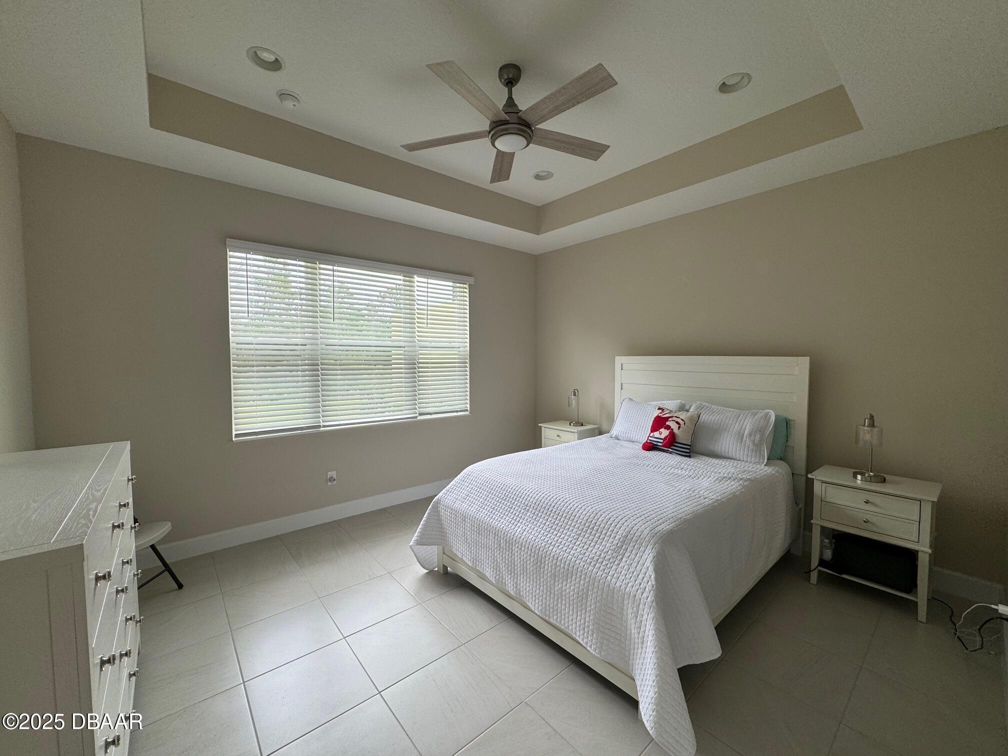 1016 Sea Shell Court Daytona Beach, FL 32124 - Photo 3 of 25 a bedroom with a bed and window