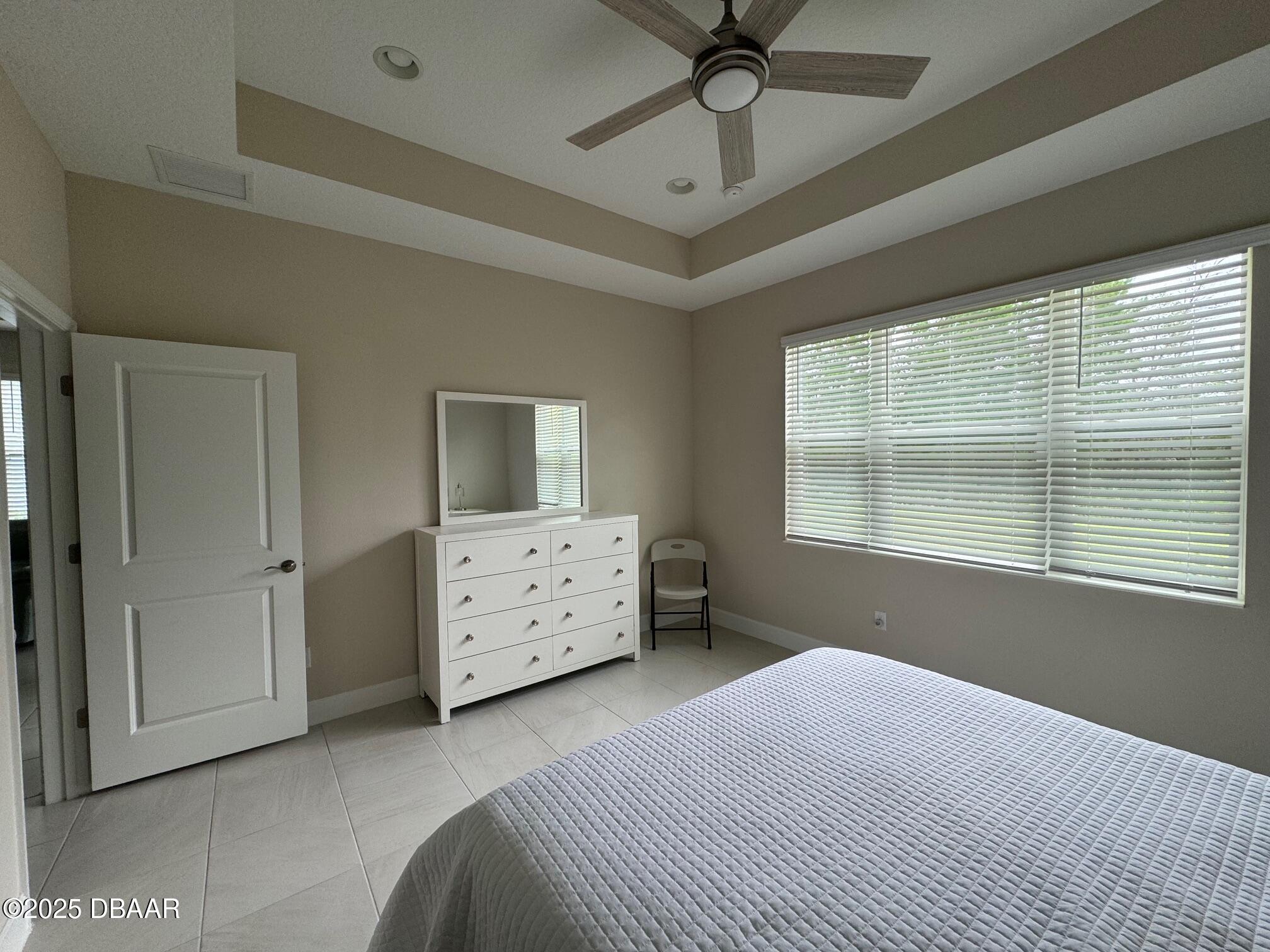 1016 Sea Shell Court Daytona Beach, FL 32124 - Photo 6 of 25 a bedroom with a bed and a window