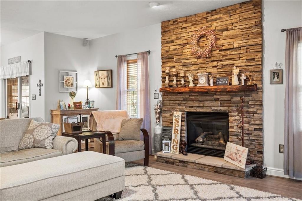 11 Kings Road Washington, PA 15301 - Photo 20 of 49 a living room with furniture a window and a fireplace