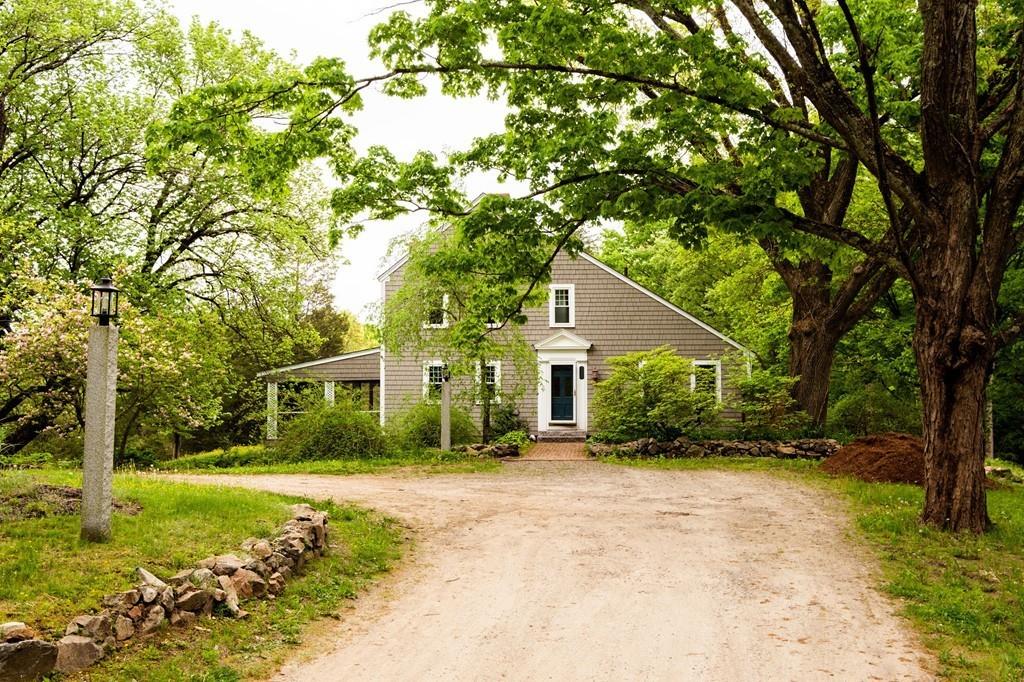 196 Middleton Road Boxford, MA 01921 - Photo 1 of 34 a front view of a house with a yard