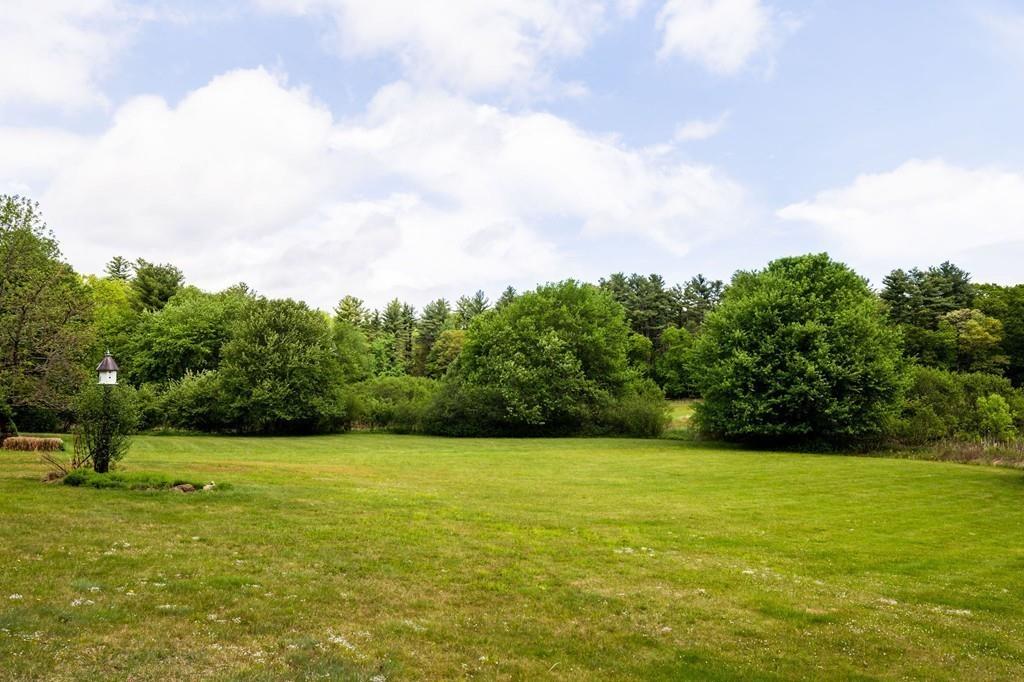 196 Middleton Road Boxford, MA 01921 - Photo 7 of 34 a view of a green field with clear sky