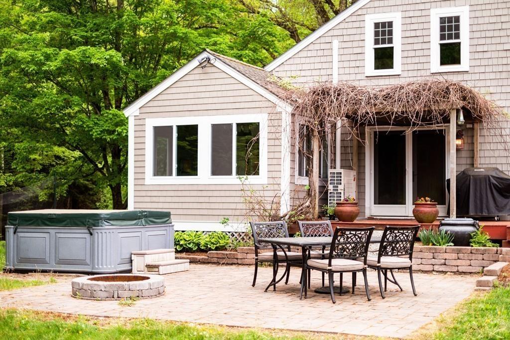 196 Middleton Road Boxford, MA 01921 - Photo 8 of 34 a view of a house with backyard and sitting area
