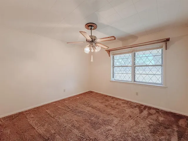 a view of an empty room with window