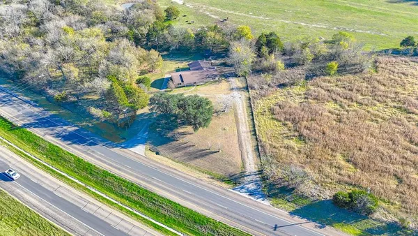 an aerial view of beach and ocean
