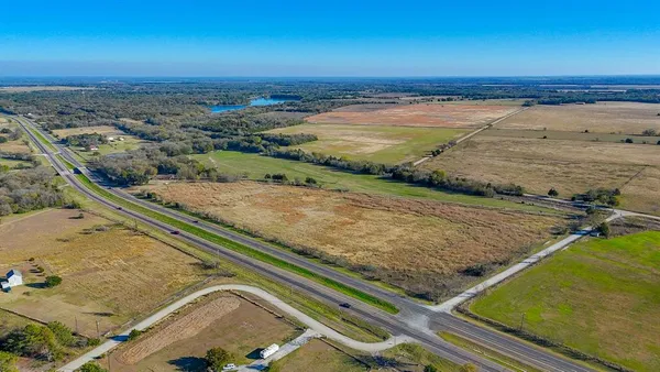 an aerial view of beach and ocean