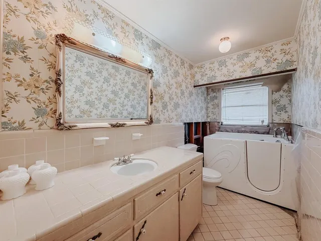 a view of a big room with carpet