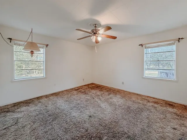 a view of a chandelier fan