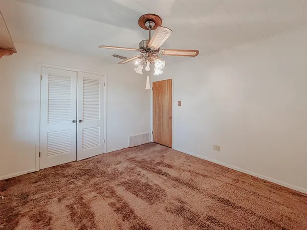 a bathroom with a sink vanity and a mirror