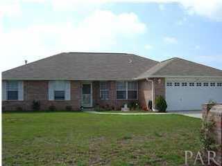 119 Gunwale Road Pensacola, FL 32507 - Photo 1 of 21 a front view of house with yard and green space