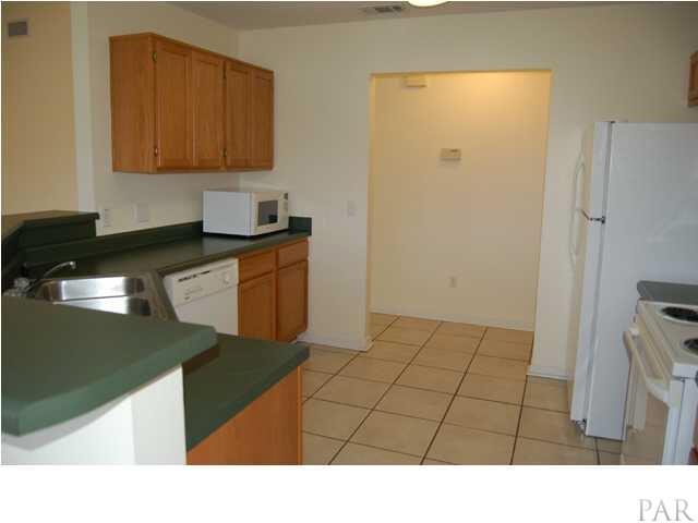 119 Gunwale Road Pensacola, FL 32507 - Photo 2 of 21 a bathroom with a sink and a cabinets