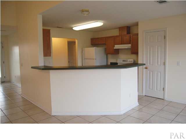 119 Gunwale Road Pensacola, FL 32507 - Photo 3 of 21 a bathroom with a sink a mirror and a toilet