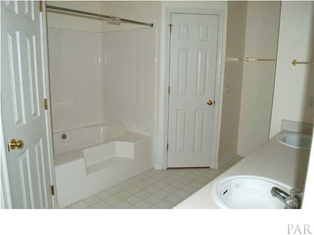 119 Gunwale Road Pensacola, FL 32507 - Photo 10 of 21 a bathroom with a tub and shower