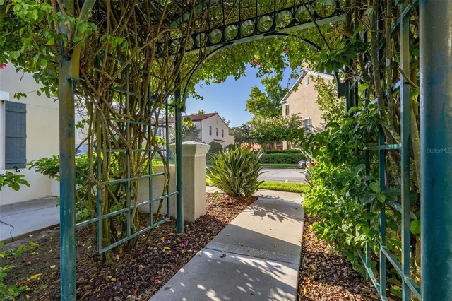 a view of a house with fountain bath tub and trees