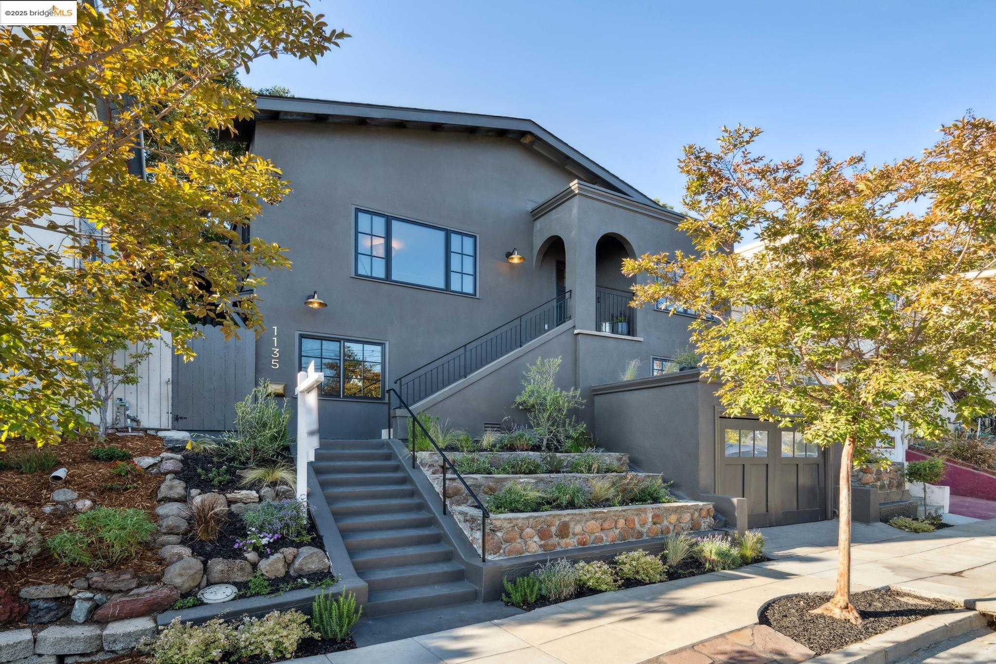 1135 Ranleigh Way Piedmont, CA 94610 - Photo 1 of 1 a front view of a house with garden