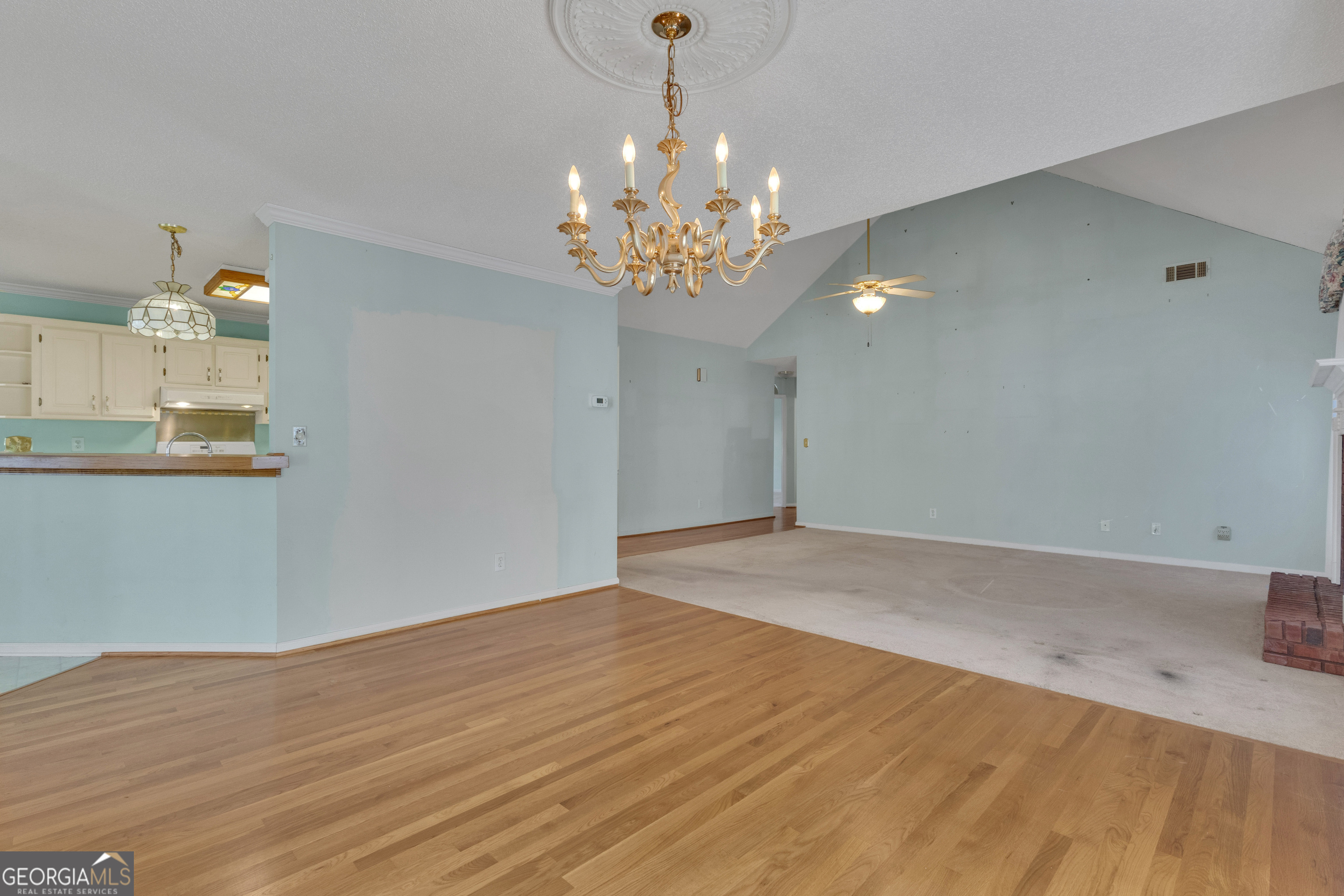 165 Masters Drive Newnan, GA 30265 - Photo 28 of 63 a view of a chandelier in a room