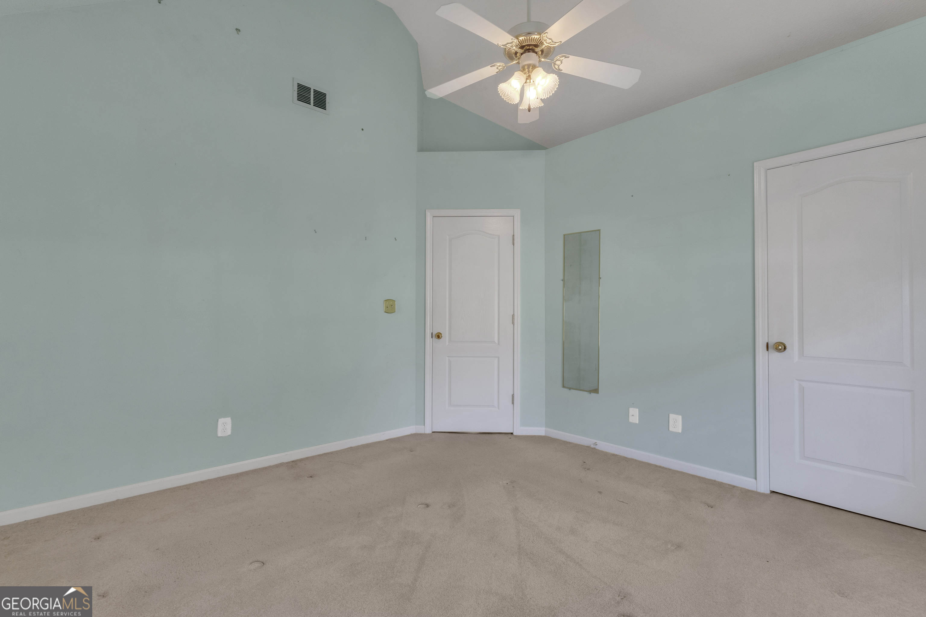 165 Masters Drive Newnan, GA 30265 - Photo 44 of 63 an empty room with a view of a bathroom