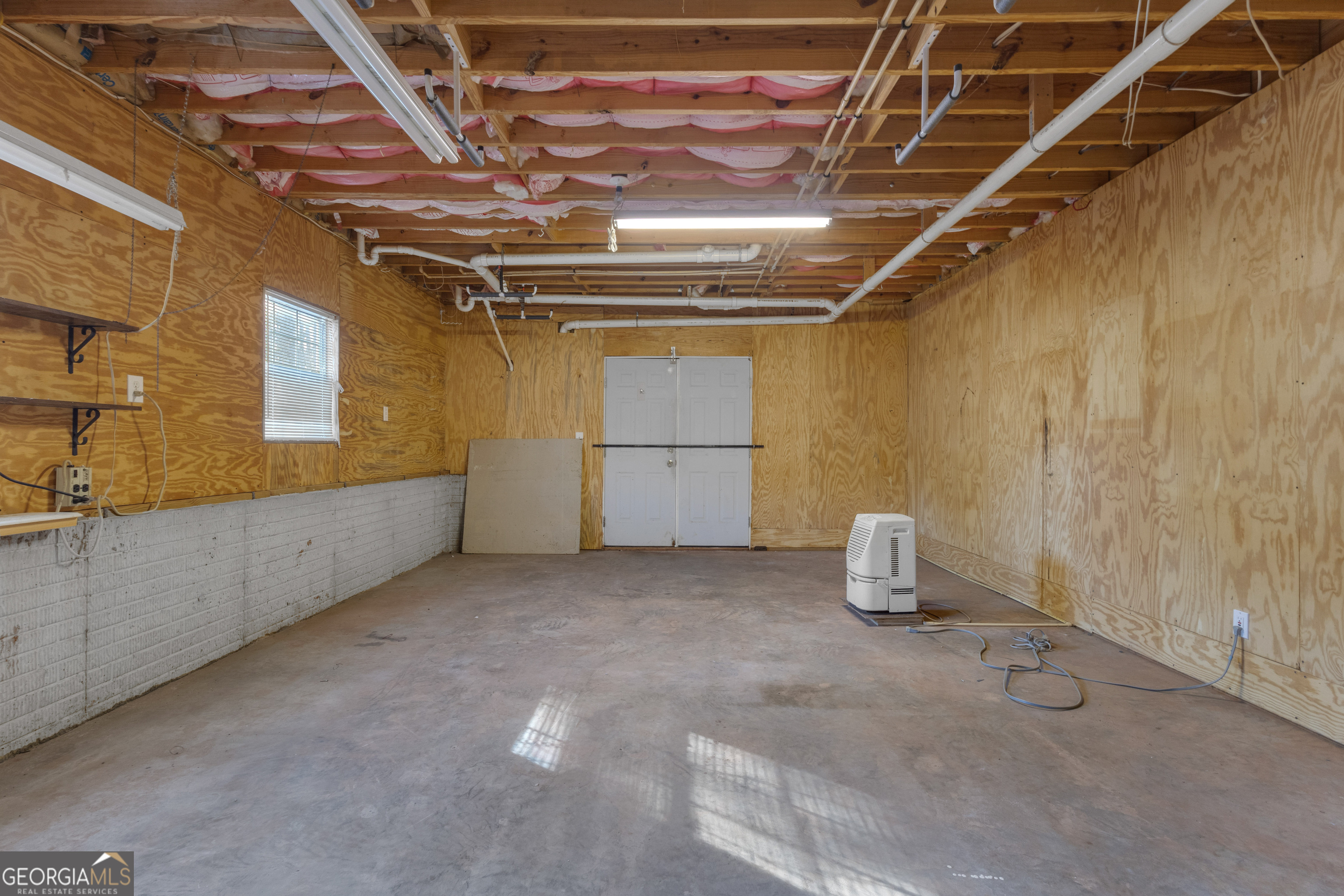 165 Masters Drive Newnan, GA 30265 - Photo 55 of 63 a view of a room with an empty space