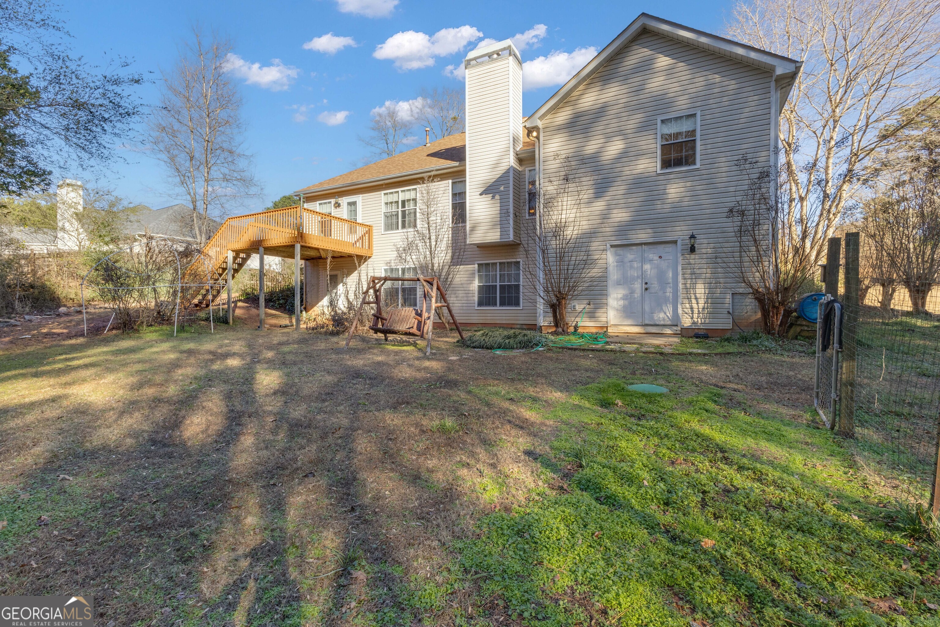 165 Masters Drive Newnan, GA 30265 - Photo 57 of 63 a view of a house with backyard