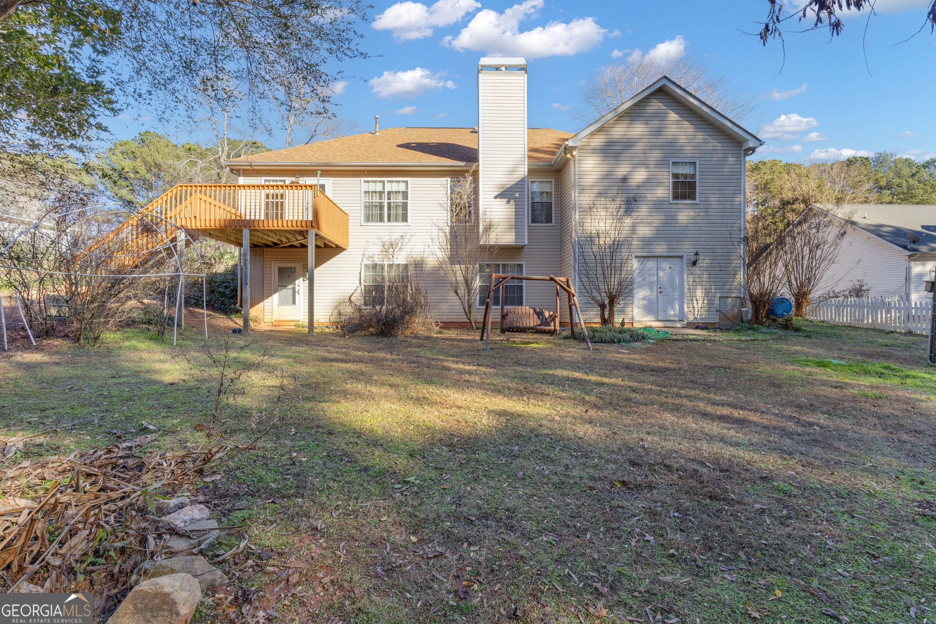 165 Masters Drive Newnan, GA 30265 - Photo 58 of 63 a view of a house with a yard