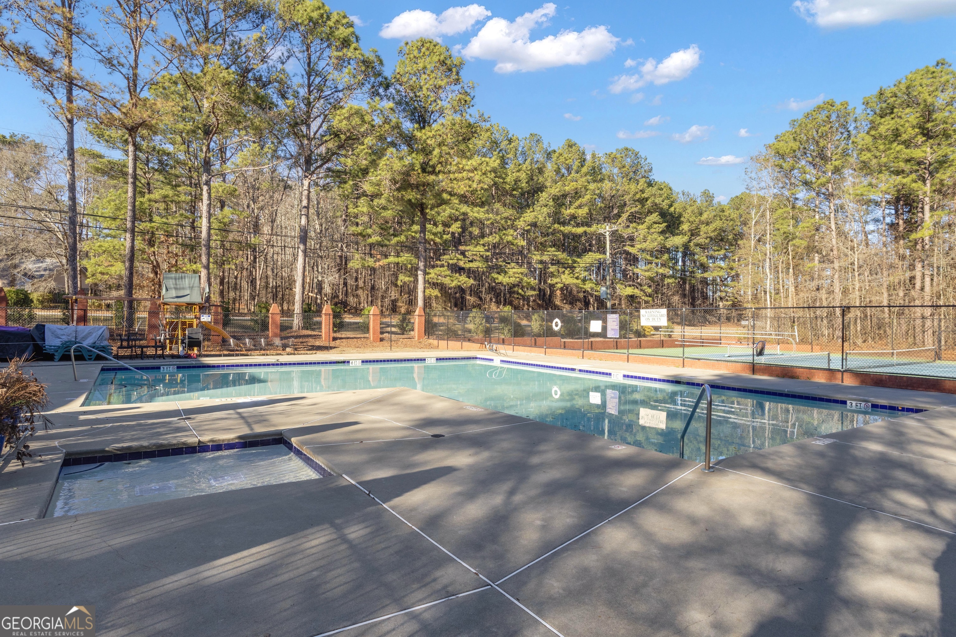 165 Masters Drive Newnan, GA 30265 - Photo 62 of 63 a view of yard with tree and wooden fence