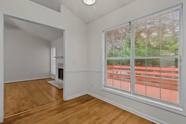 a view of an empty room with a window