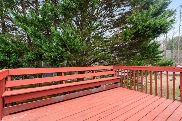 a view of balcony with furniture