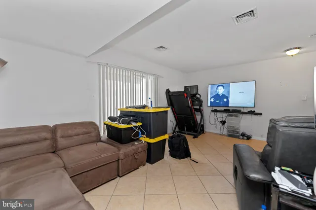 a view of balcony with furniture