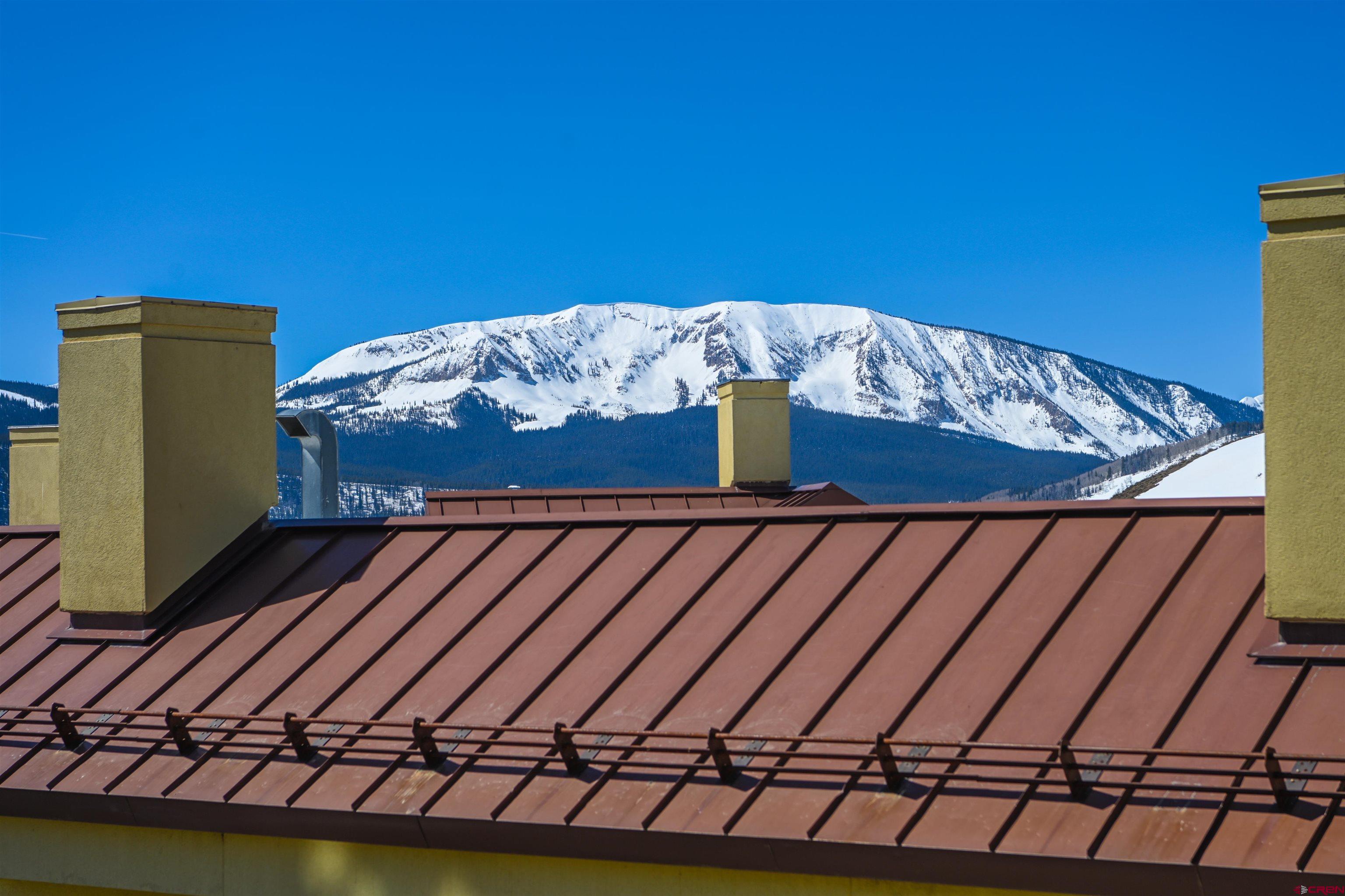 500 Gothic Road, Unit 605 Crested Butte, CO 81225 - Photo 23 of 27 a view of a balcony with wooden floor