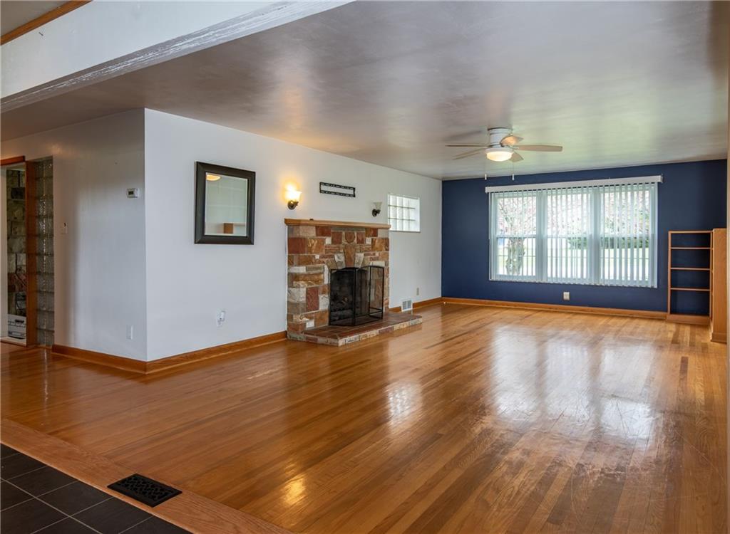 105 Donation Road Greenville, PA 16125 - Photo 4 of 19 Living Room with gorgeous hardwood floors and fireplace.