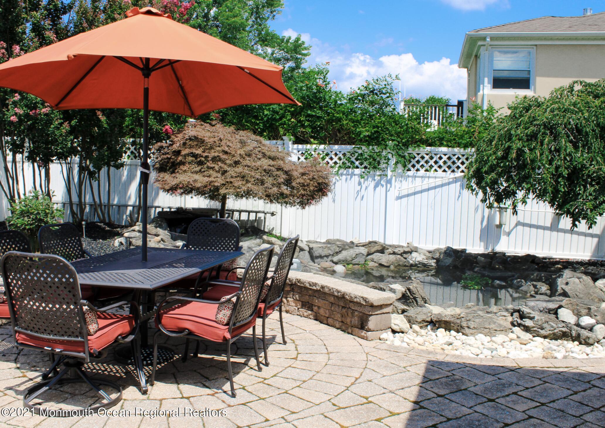 231 South Riverside Drive Neptune Township, NJ 07753 - Photo 26 of 33 Patio/Koi Pond
